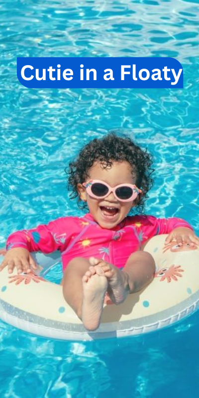 Cute little girl wearing pink shades in an inflatable floater