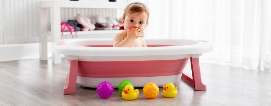 Baby in a folding bath tub